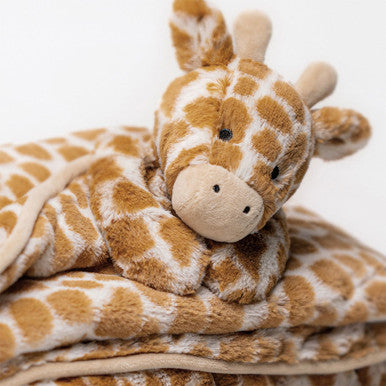 Doudou girafe timide