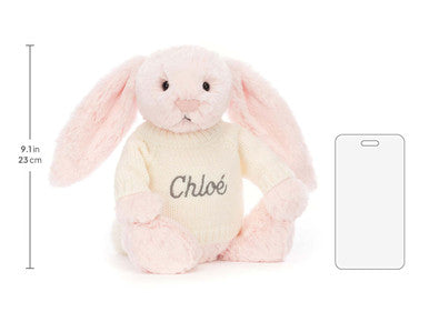 Lapin rose timide avec pull crème personnalisé