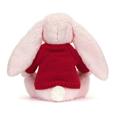 Lapin rose timide avec pull rouge personnalisé